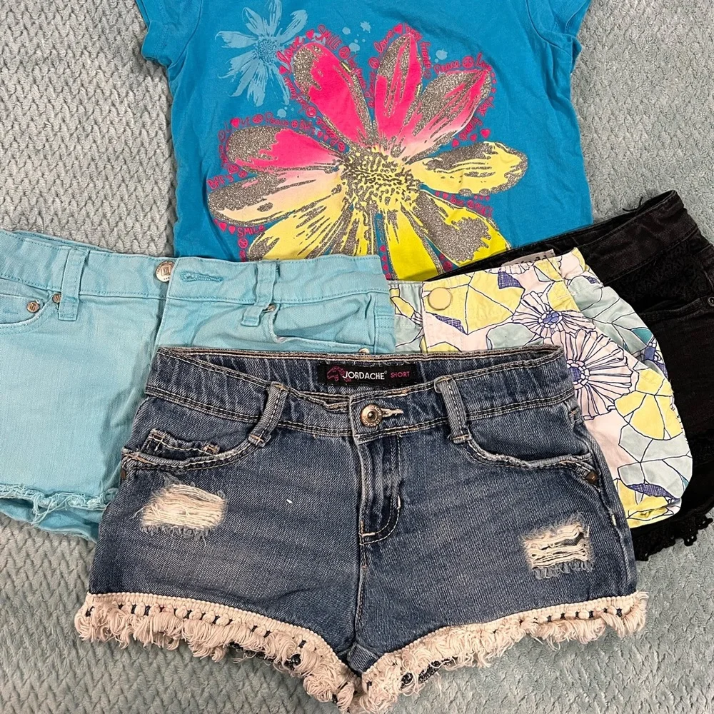 Four pair shorts for girls. 7/8 - Picture 1 of 2